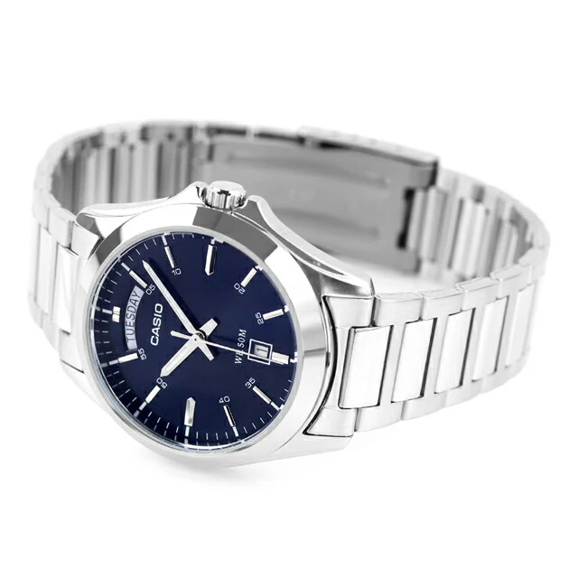MTP-1370D-2A2V-10 ساعت مچی مردانه Casio MTP‑1370D‑2A2V با صفحه آبی کلاسیک، قاب و بند استیل نقرهای، نمایش روز و تاریخ، شیشه مینرال و مقاومت آب ۵۰ متر؛ مناسب استایل رسمی و روزمره شیک
