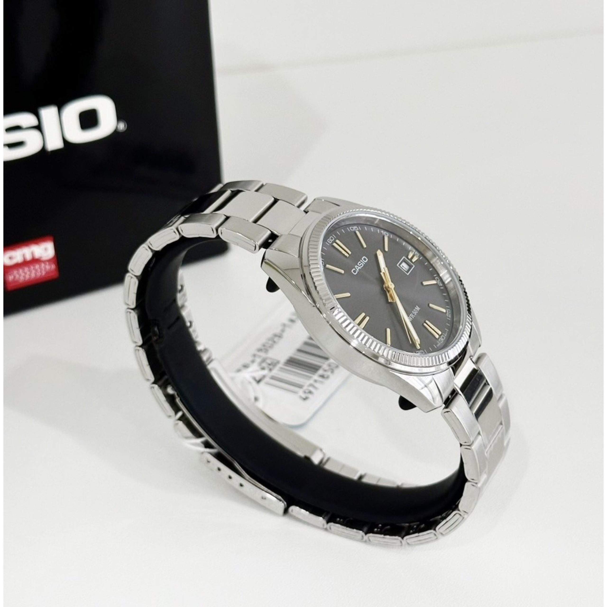 Casio-MTP-1302D-1A2 ساعت مچی مردانه کاسیو MTP-1302D-1A2 با قاب کنگرهدار و صفحه مشکی طلایی